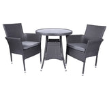 Grey rattan bistro set with round glass table and two cushioned chairs
