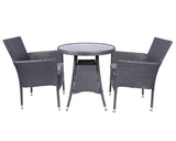 Grey rattan garden dining set with round glass table and three armchairs