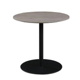 Round wooden table with black metal pedestal base, modern furniture design