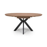 Oval wooden dining table with black metal cross legs on white background