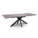 Rectangular dining table with wood effect top and black metal star-shaped base