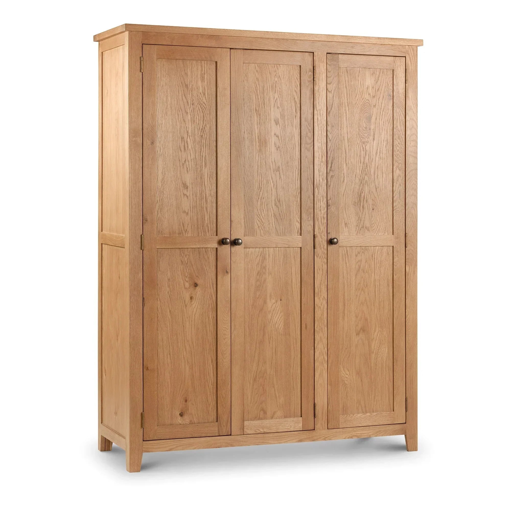 Oak three door wardrobe with panel doors and metal handles on white background
