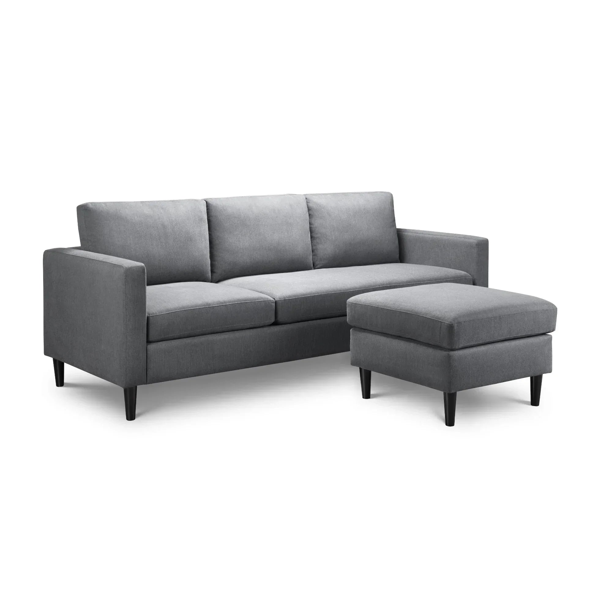 Grey corner sofa with three seat cushions and ottoman on black legs, isolated on white