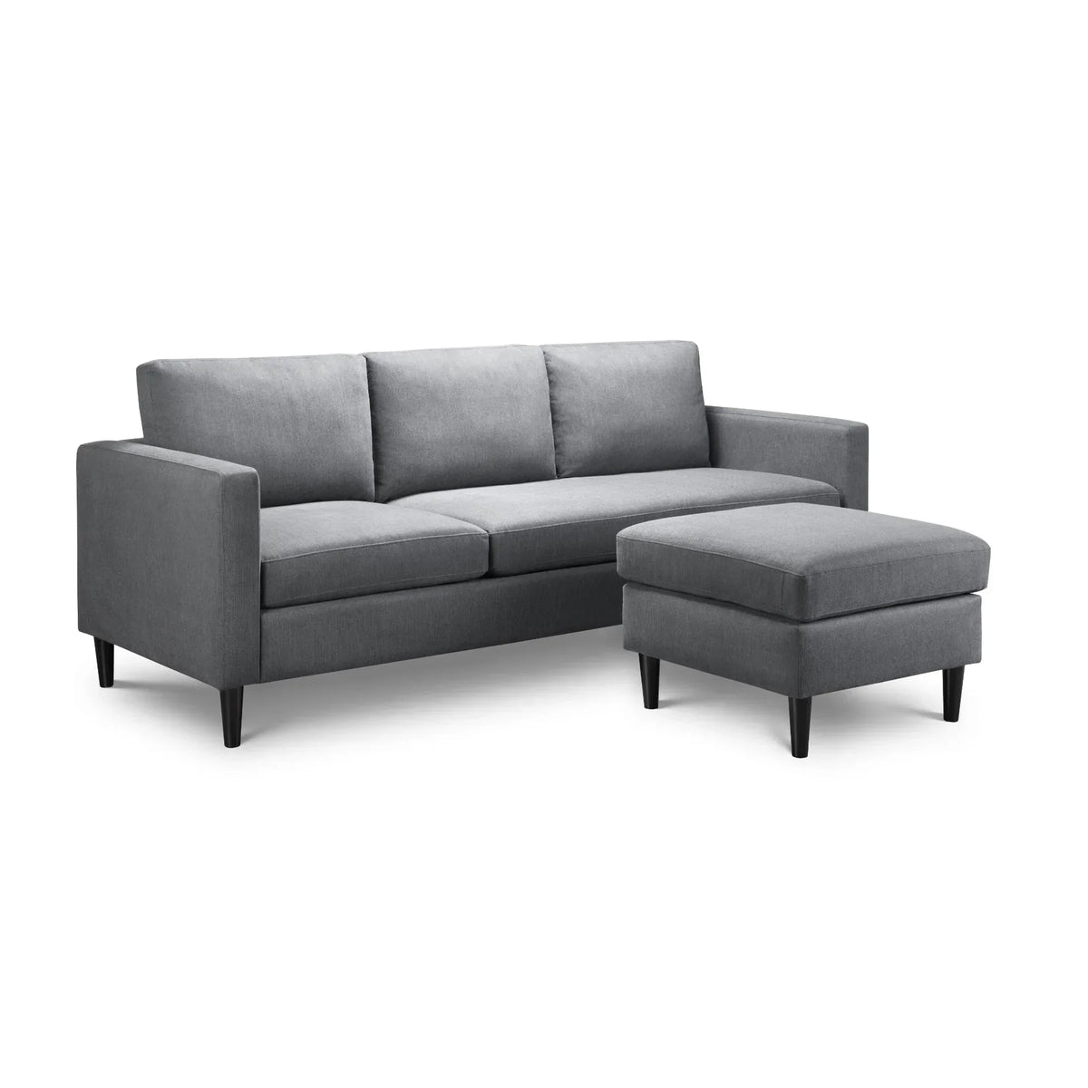 Grey corner sofa with three seat cushions and ottoman on black legs, isolated on white