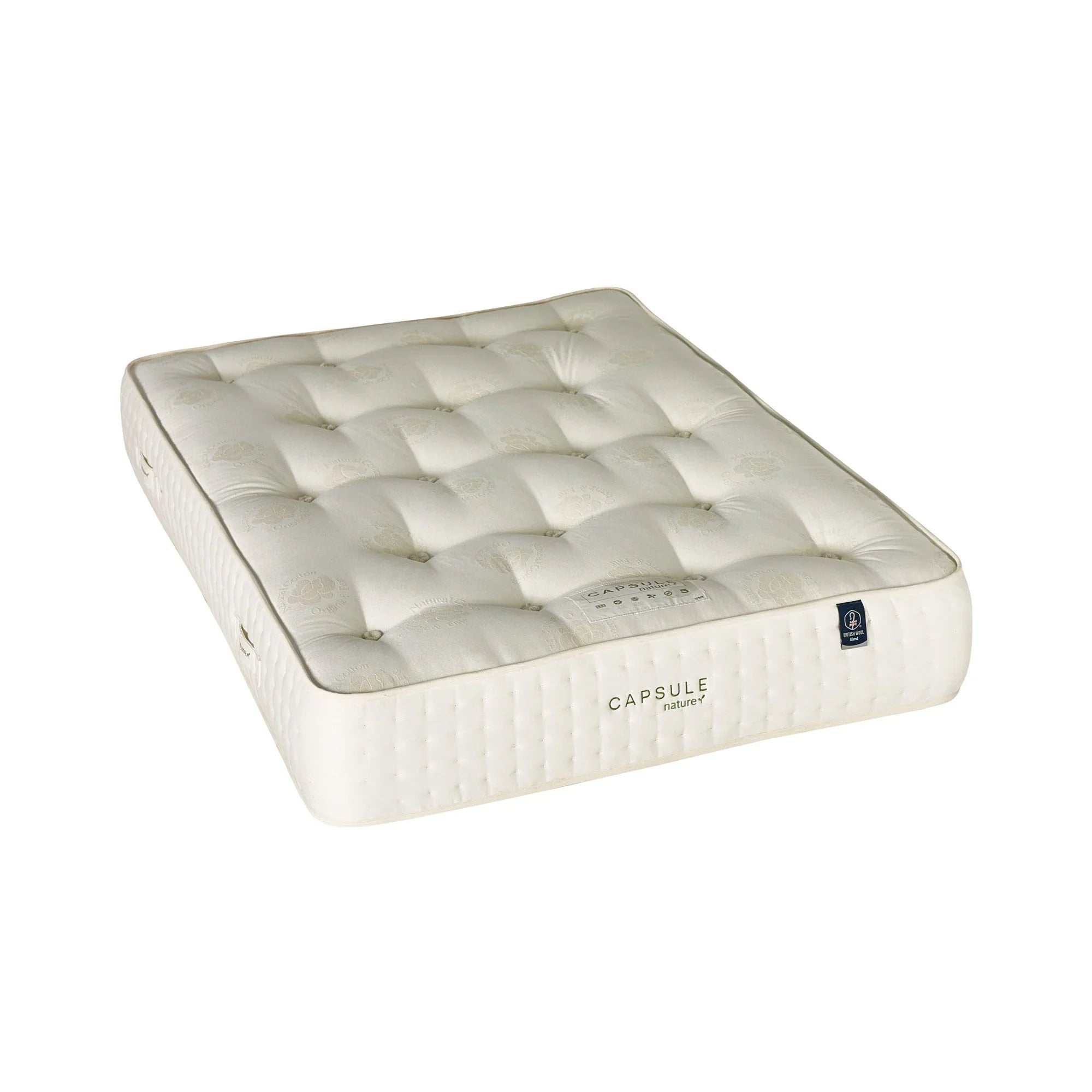 Double mattress with tufted surface and capsule label, cream fabric, angled front view