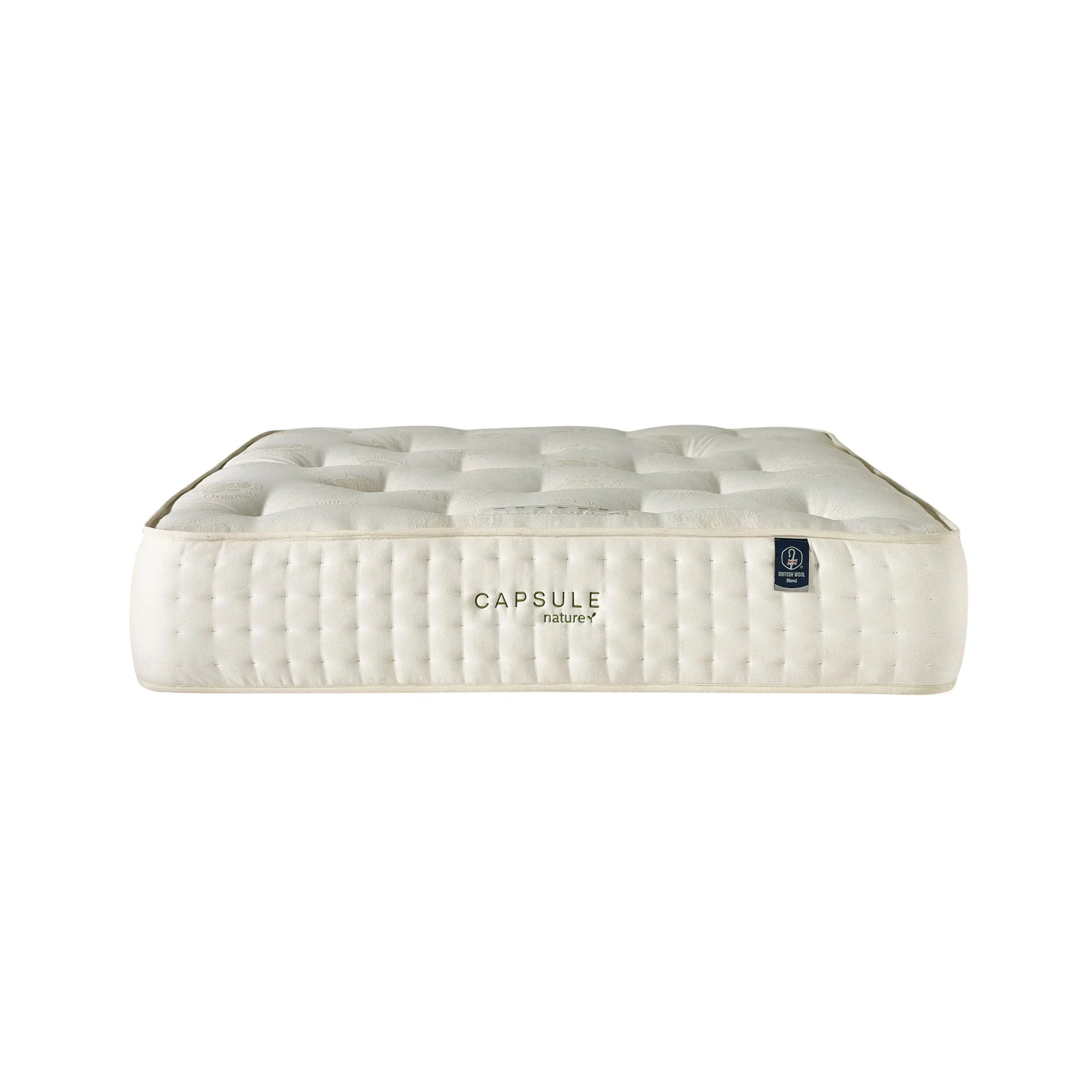 Double sided pocket sprung mattress with tufted surface and quilted side panel