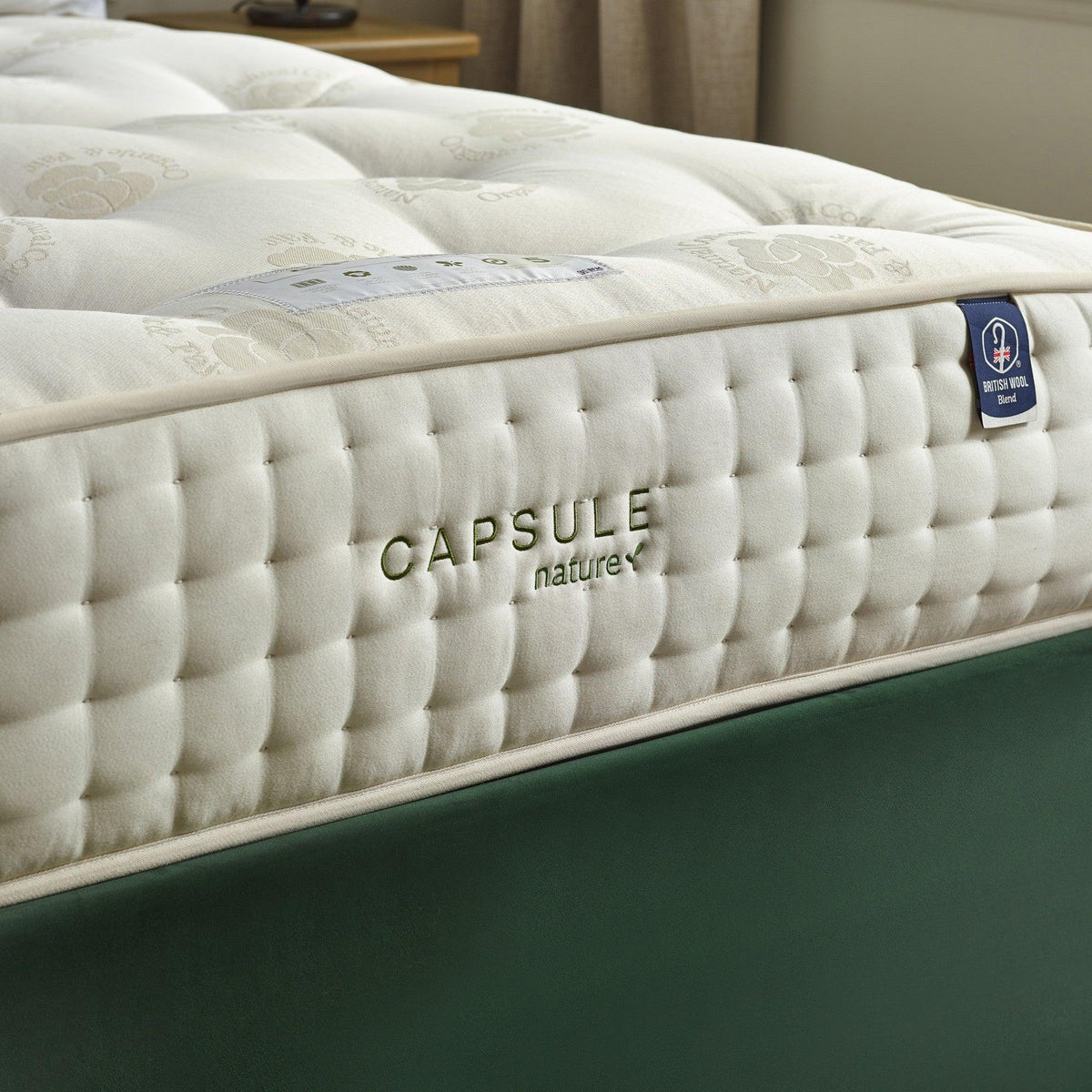 Luxury capsule mattress with British wool blend, quilted surface, side logo detail