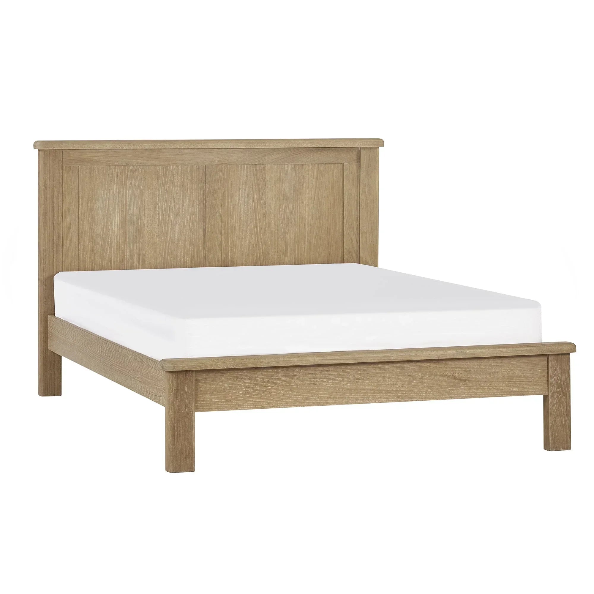 Memphis limed oak bed frame with headboard and white mattress, 135cm size, front view