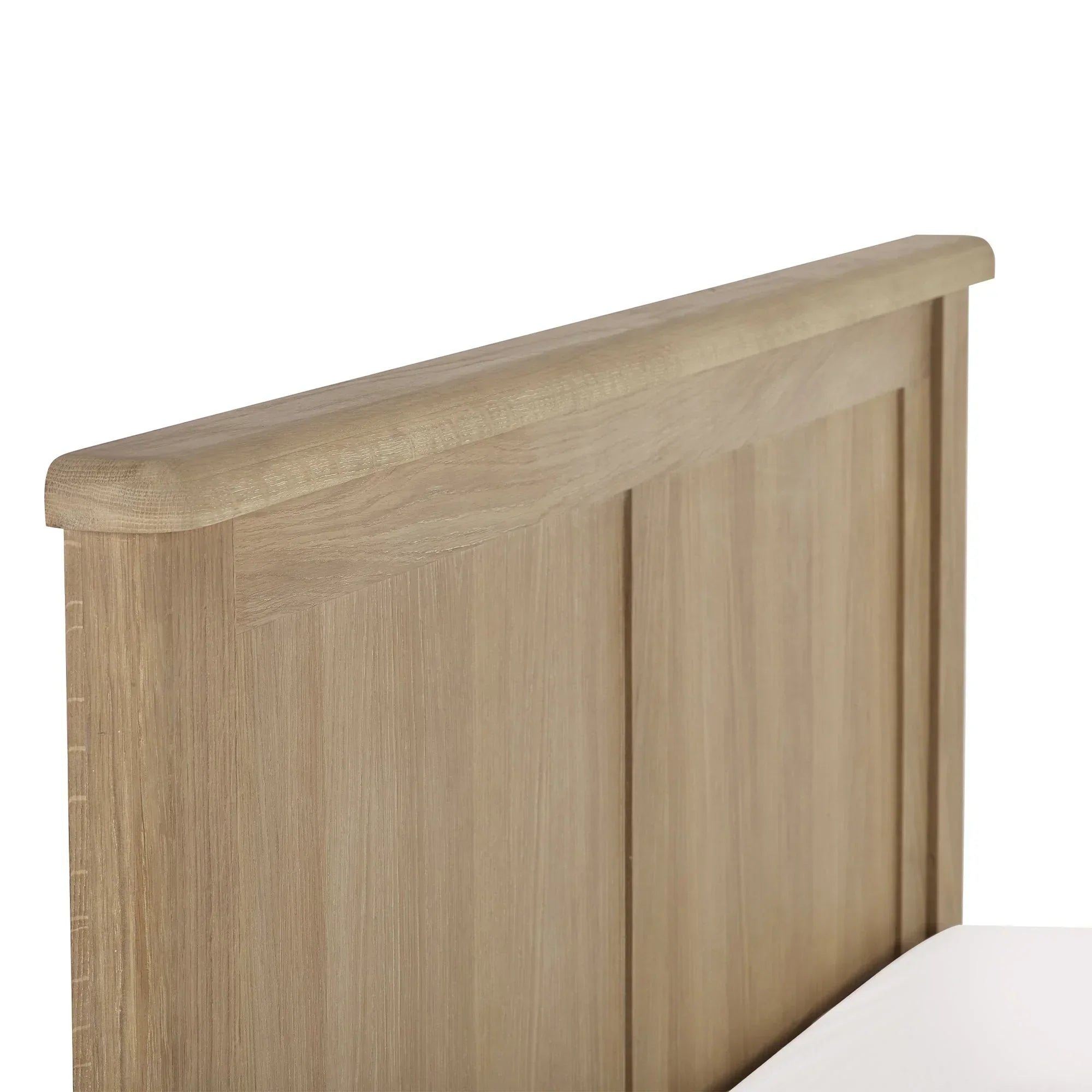 Close up of Memphis limed oak bed headboard showing wood grain and panel details