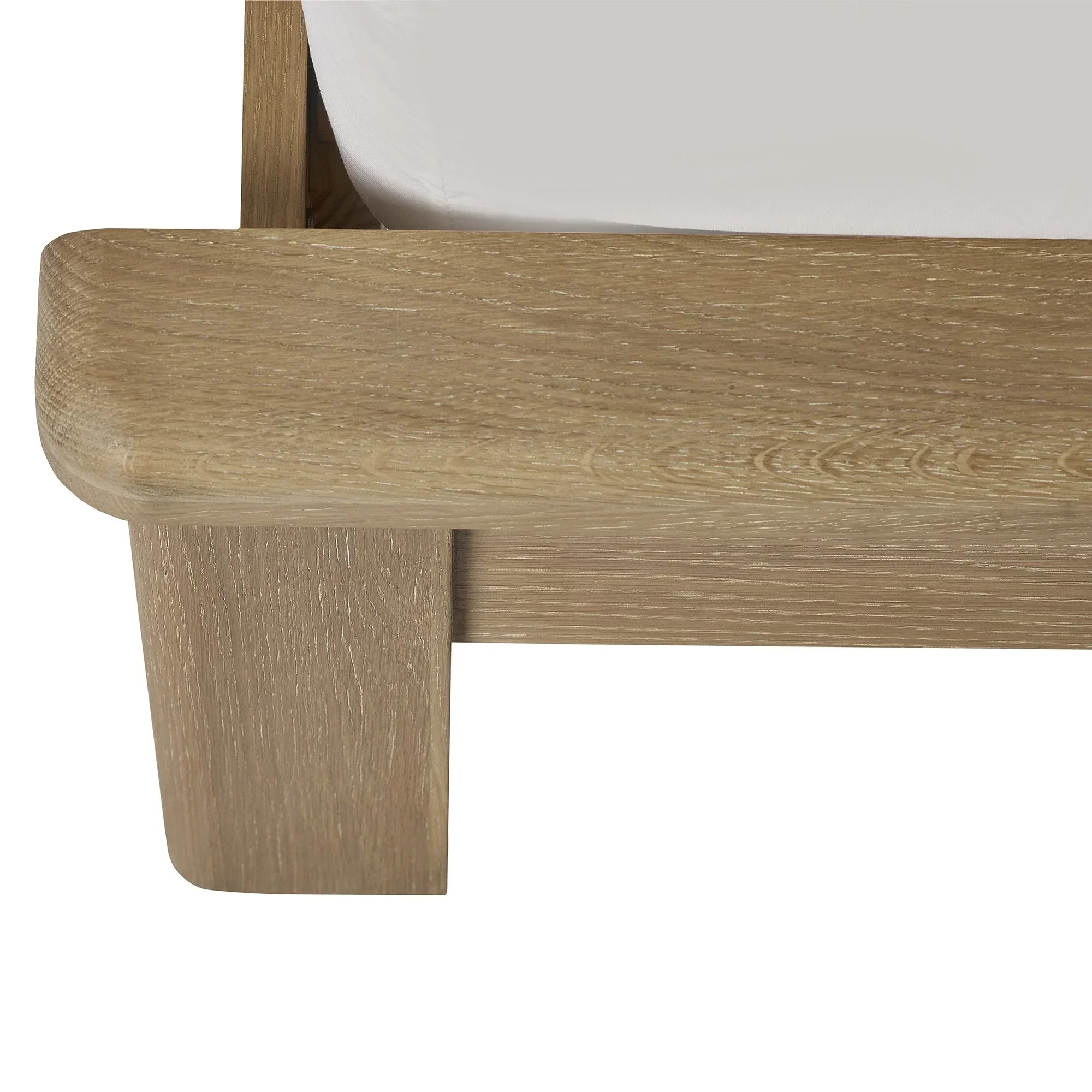 Close-up of Memphis limed oak bed frame corner with visible wood grain detail