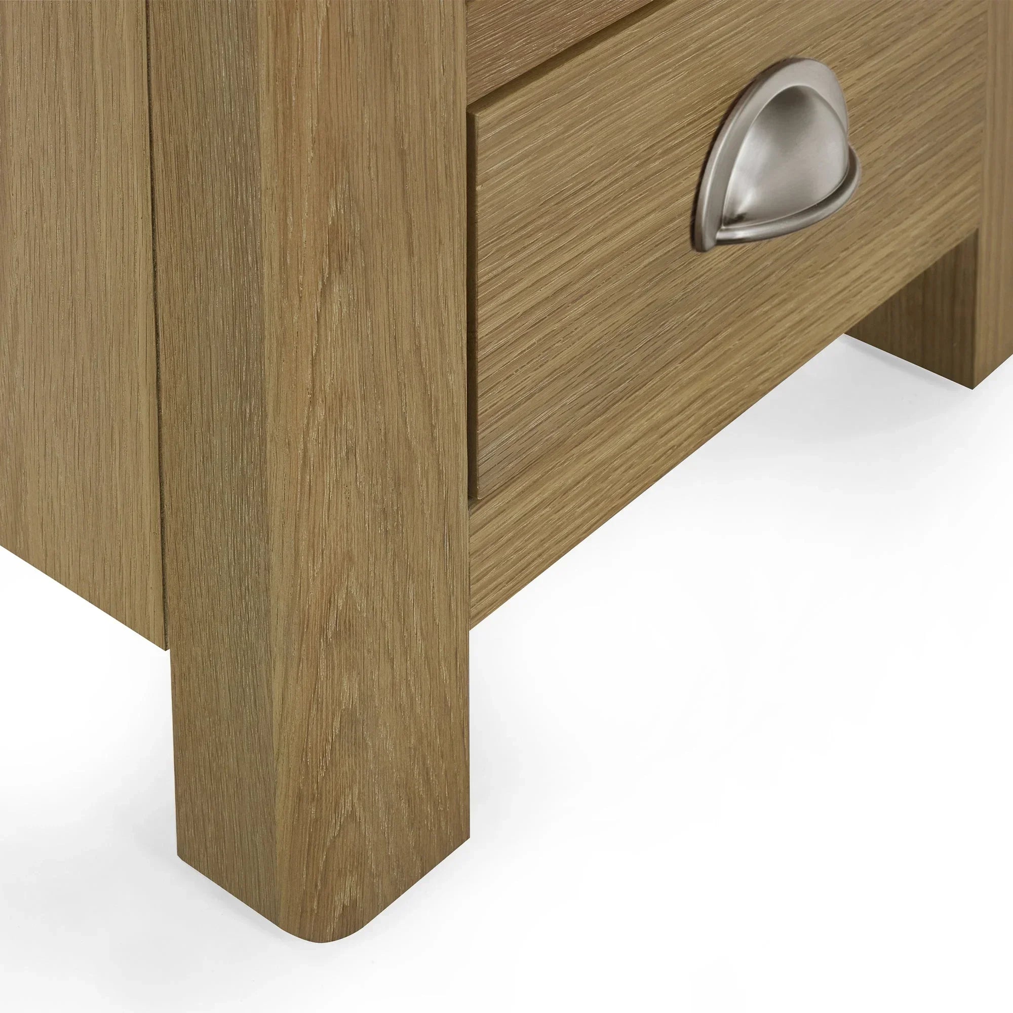 Memphis limed oak 3 drawer bedside table with metal cup handle, close-up view