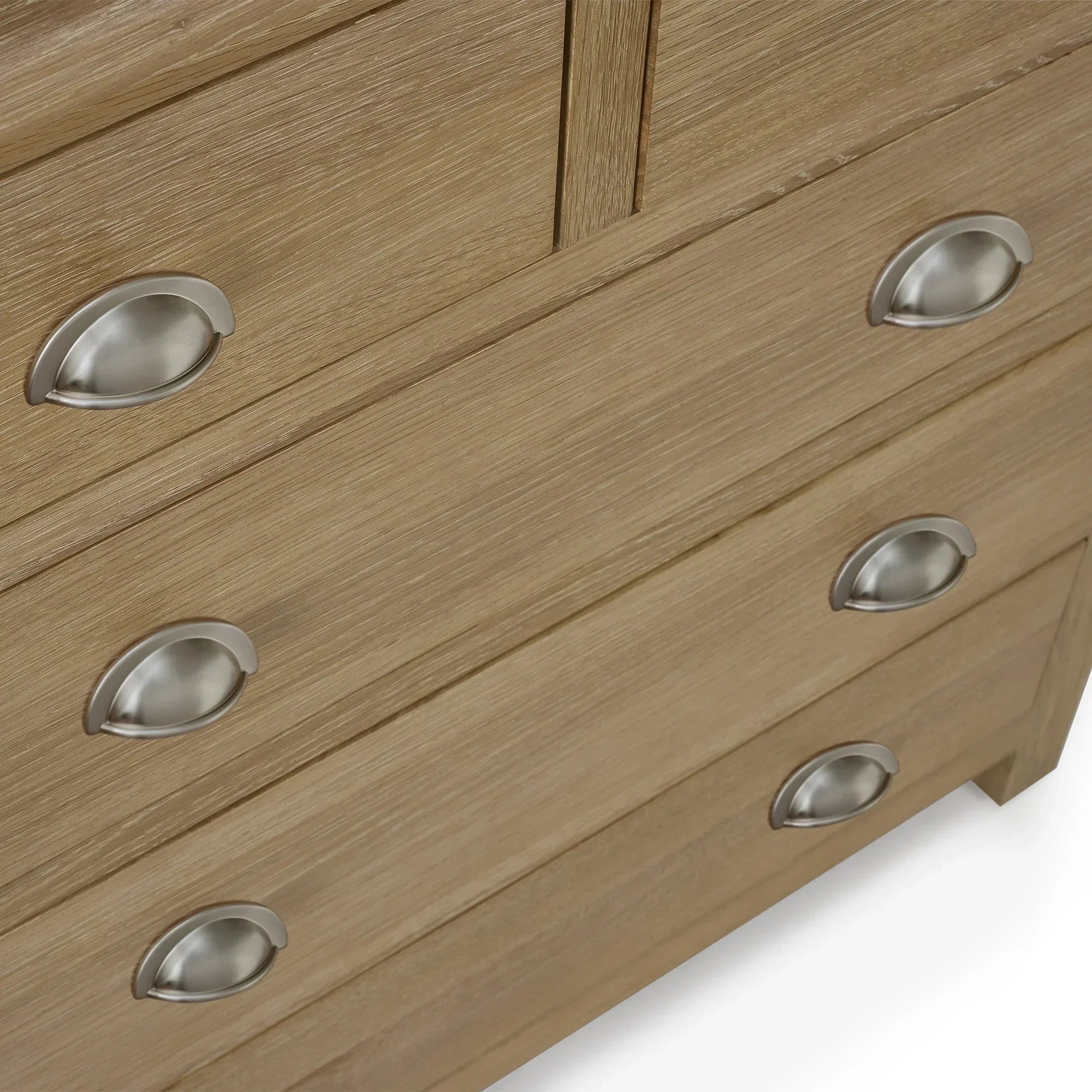 Memphis limed oak 2 drawer chest with brushed metal cup handles closeup