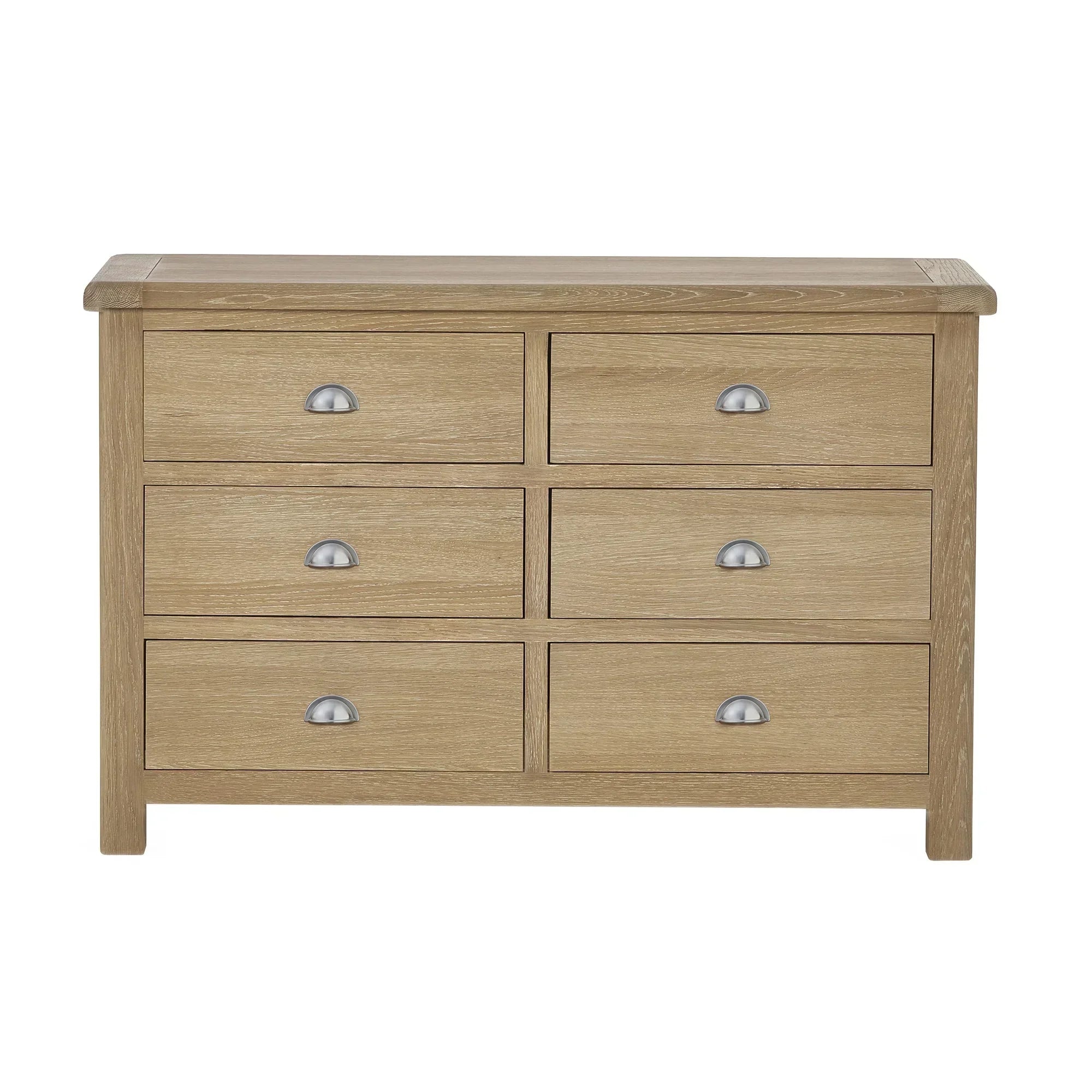Wide limed oak 6 drawer chest with silver cup handles, front view
