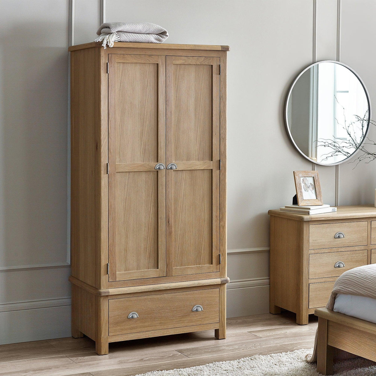 Memphis limed oak 2 door 1 drawer wardrobe with silver handles in bedroom setting