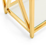 Gold metal frame and glass shelf detail on modern coffee table