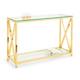 Glass console table with gold metal frame, lower shelf holding a book, two glasses on top