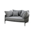 Grey fabric loveseat with rope-wrapped sides and five matching scatter cushions