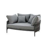 Grey fabric loveseat with rope-wrapped sides and five matching scatter cushions