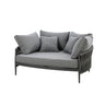 Grey fabric loveseat with rope-wrapped sides and five matching scatter cushions