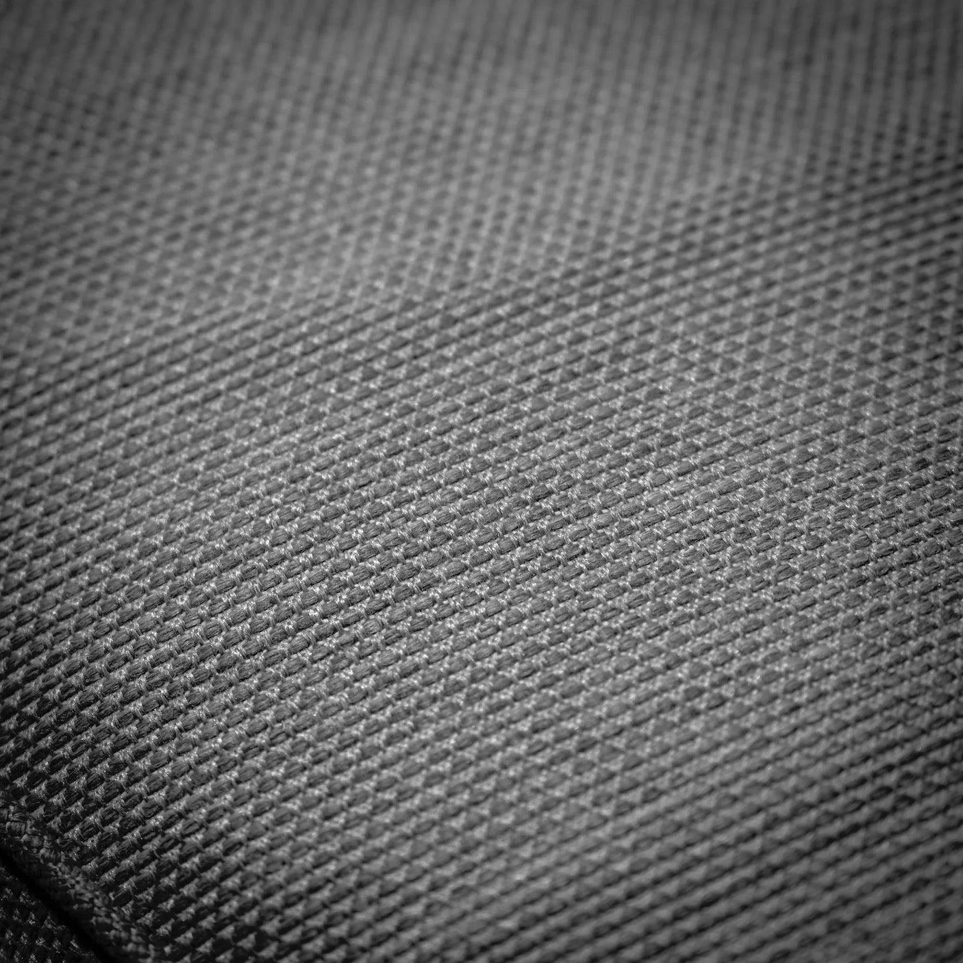 Close view of grey fabric texture for sofa upholstery