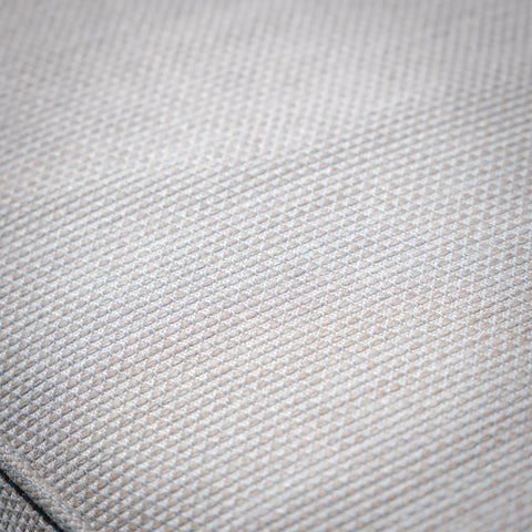 close-up of textured beige sofa fabric upholstery