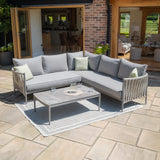 Grey outdoor corner sofa set with rope detail and coffee table on patio
