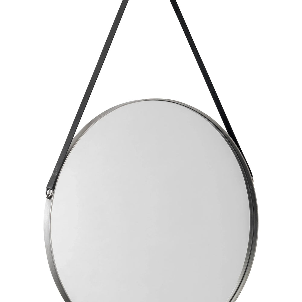 Round wall mirror with metal frame and black hanging strap against white background