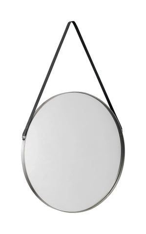 Round wall mirror with metal frame and black hanging strap against white background