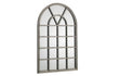 Arched window mirror with distressed metal frame and grid pattern for home decor