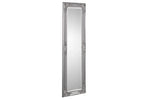 Tall silver ornate wall mirror with decorative carved frame, angled view