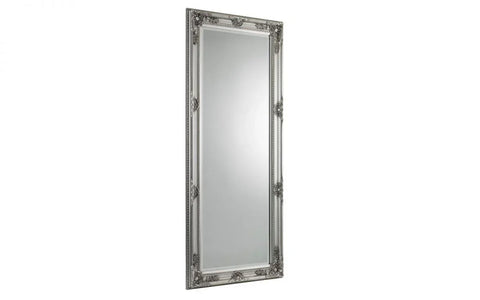 Tall rectangular silver mirror with ornate decorative frame detailing