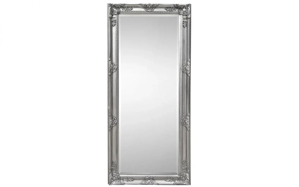 Large rectangular wall mirror with ornate silver frame and decorative floral accents