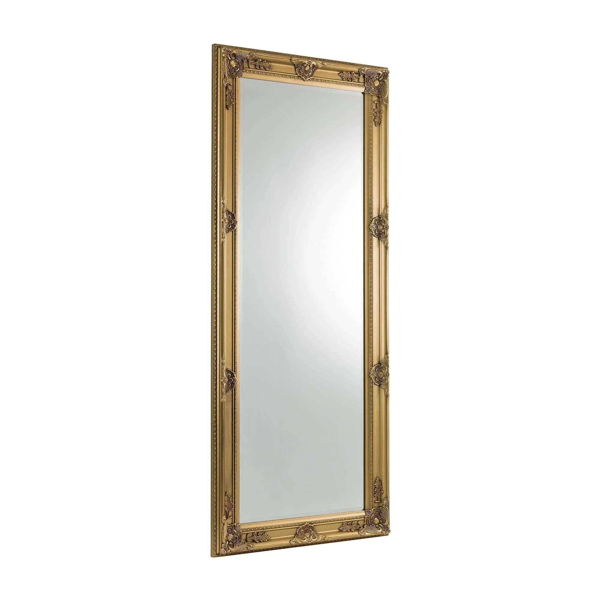 Gold ornate dress mirror with decorative frame, leaning style, angled view on white background