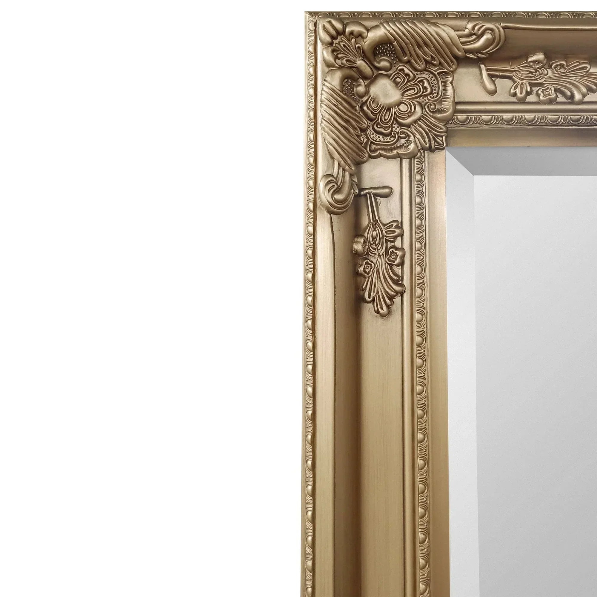 Gold dress mirror with ornate carved frame corner detail