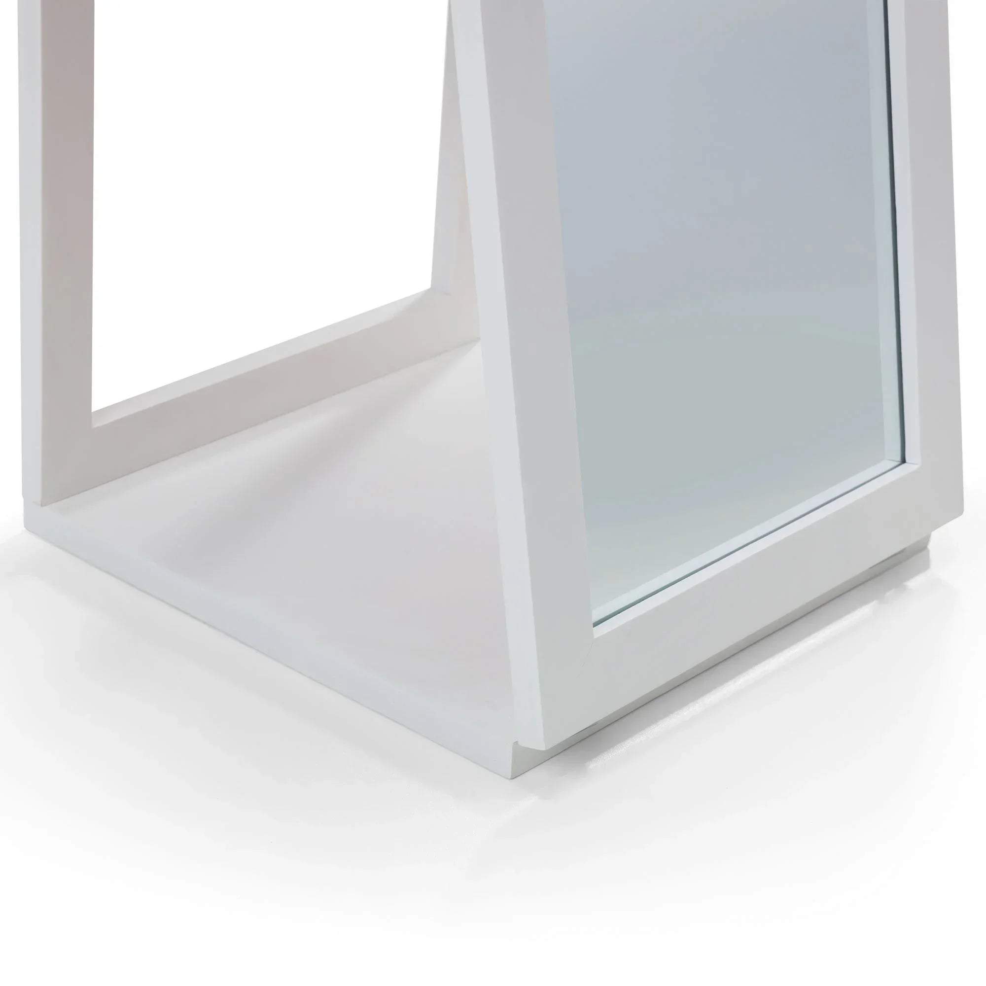 Close-up of white storage mirror base showing frame detail and smooth finish