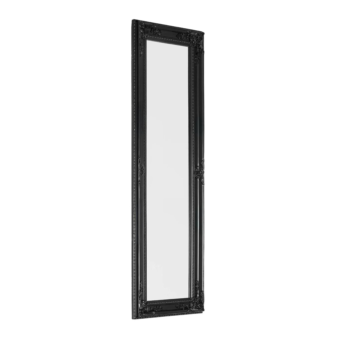 Tall black ornate wall mirror with decorative frame, angled view