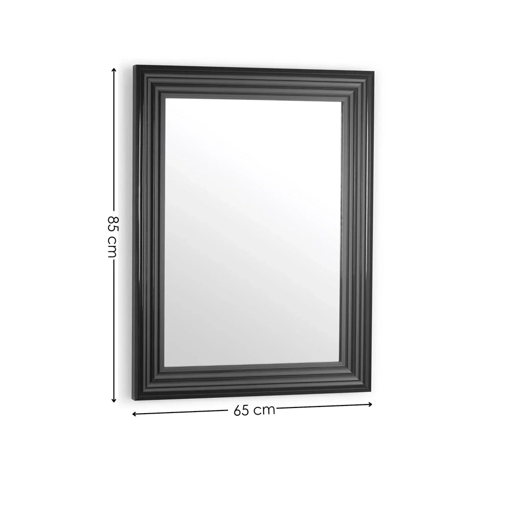 Rectangular wall mirror with black frame, 85 cm by 65 cm, shown on white background