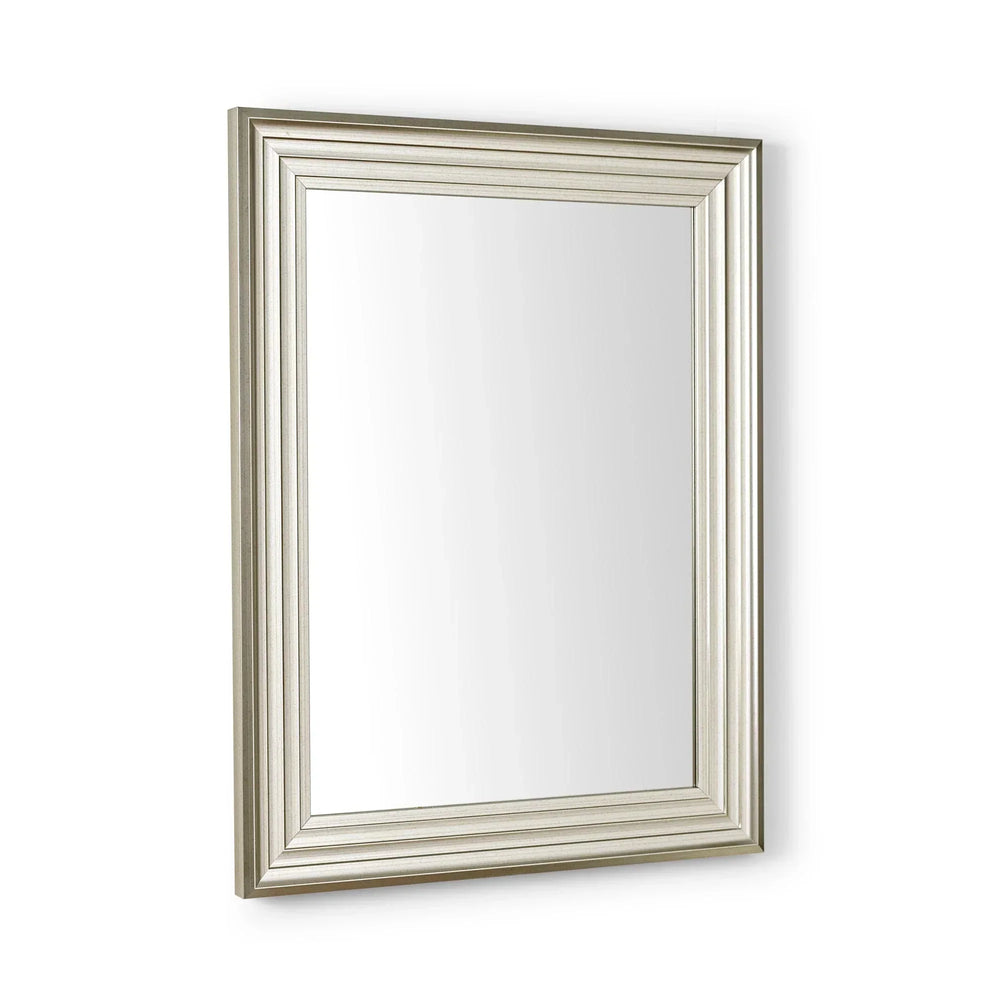 Rectangular wall mirror with silver grooved frame and clear glass, angled side view