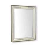 Rectangular wall mirror with silver grooved frame and clear glass, angled side view