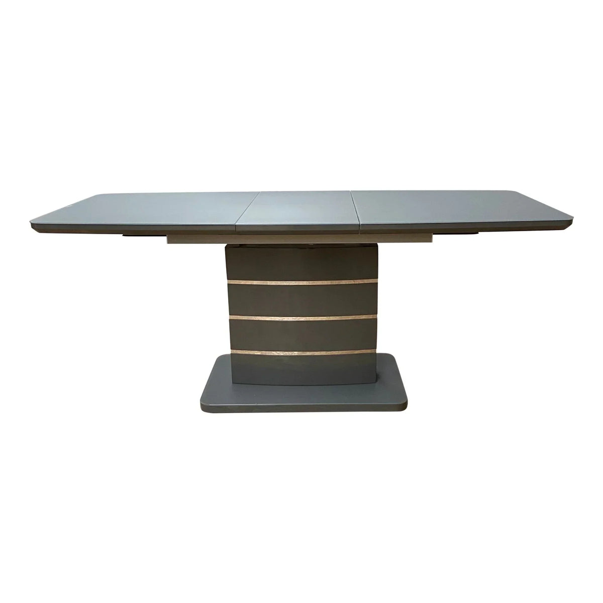 Grey extending dining table with modern pedestal base and gold trim accents