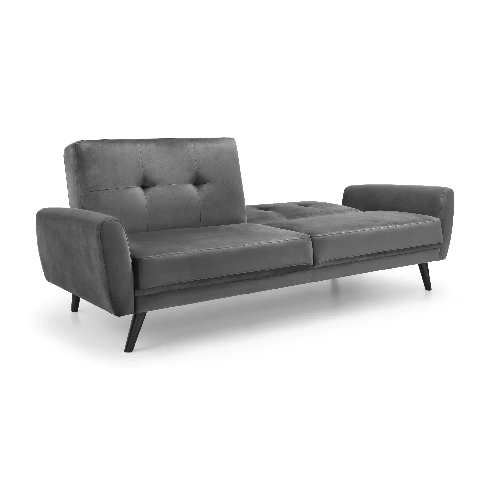 Grey velvet sofabed with angled black legs and tufted seat, shown in open position