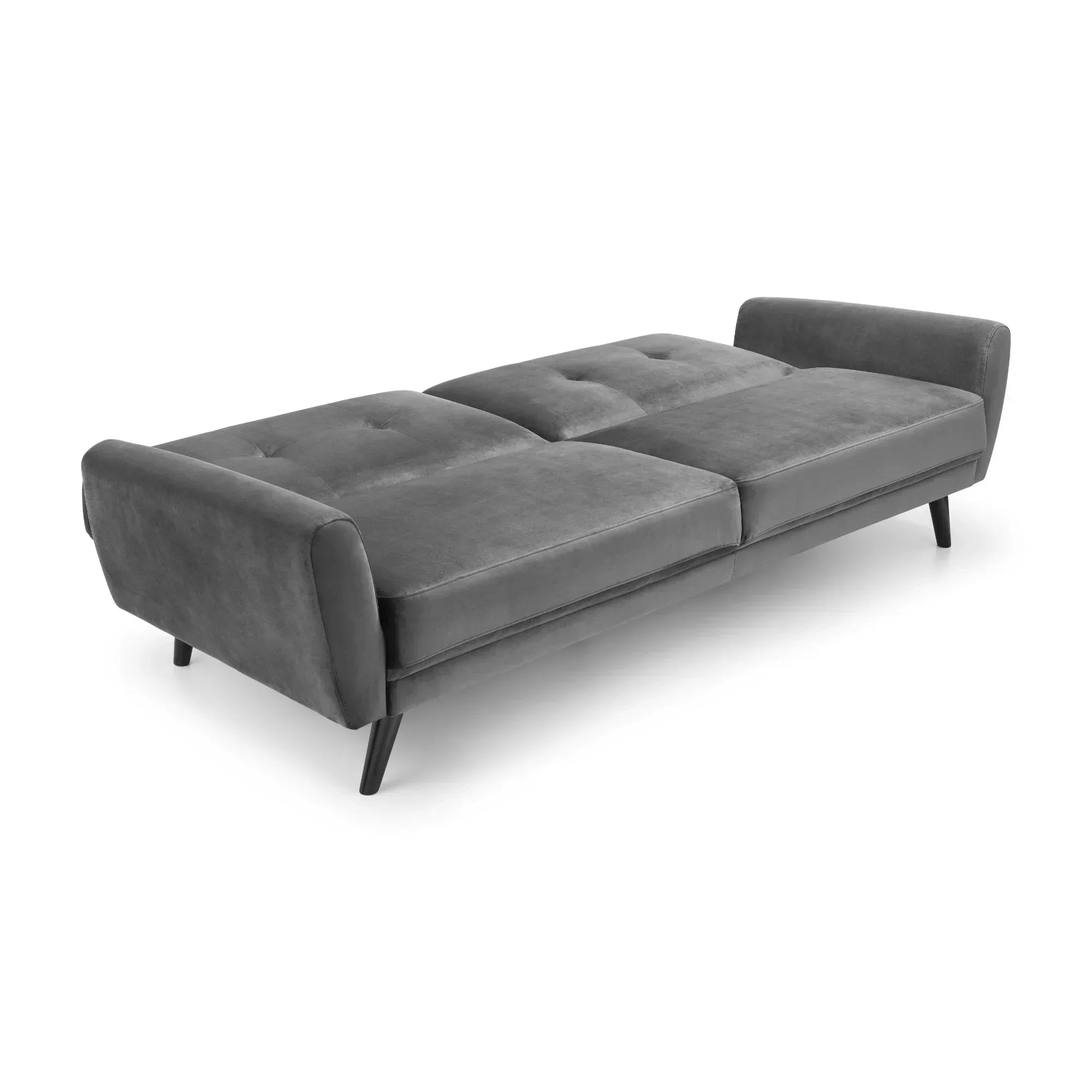 Grey velvet sofabed with tufted seat, side arms, and black legs in open position