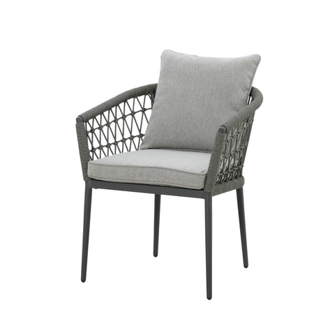 Grey woven garden armchair with soft seat and back cushions on white background