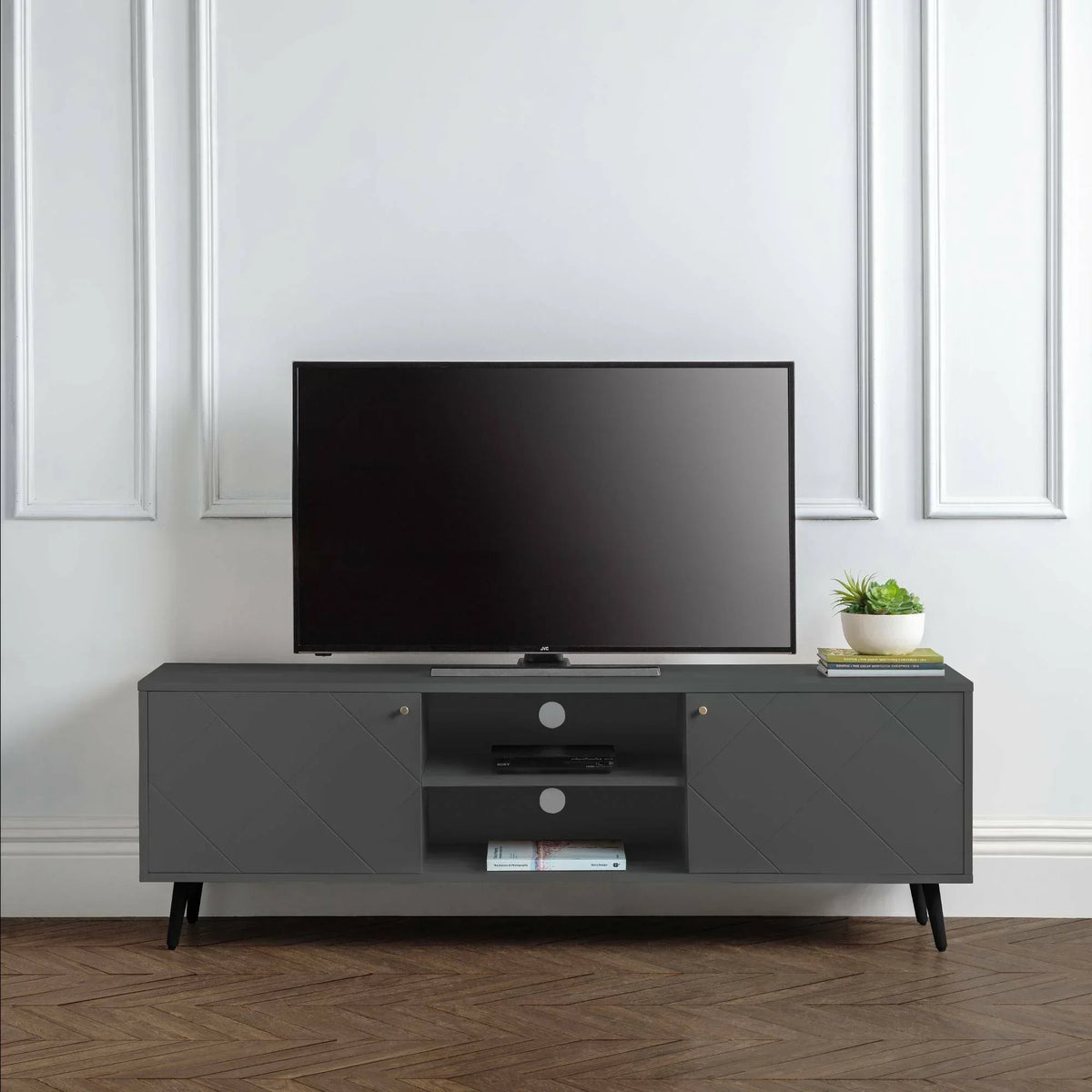 Anthracite TV cabinet with storage shelves, flat screen TV, and plant in modern living room