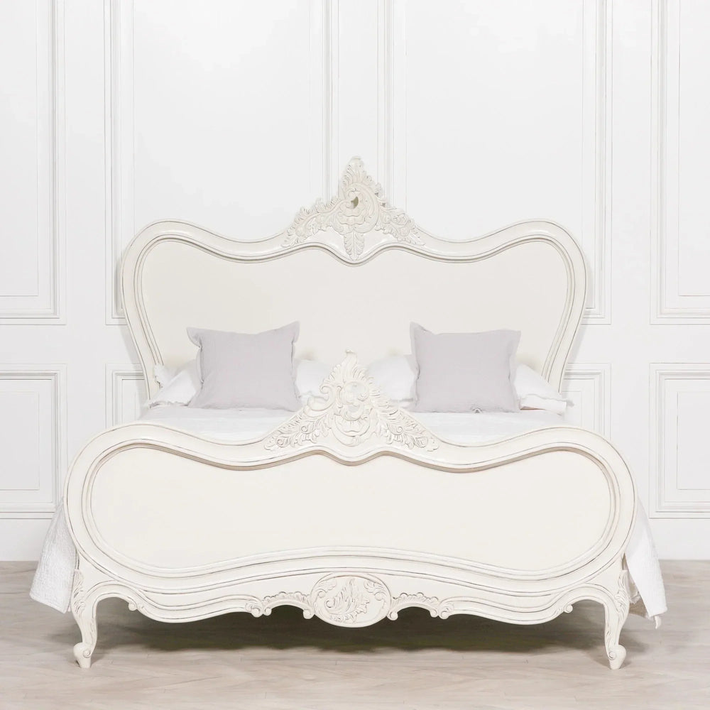 French style cream wooden bed frame with carved detail and high headboard