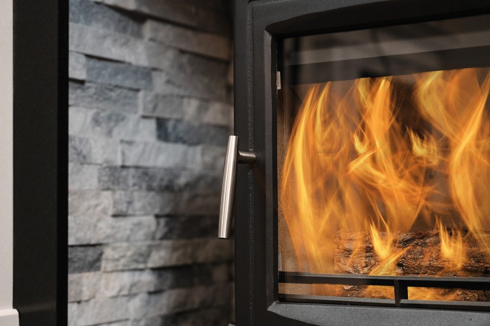 Close-up of Mourne Eco 5 stove showing steel body and door details