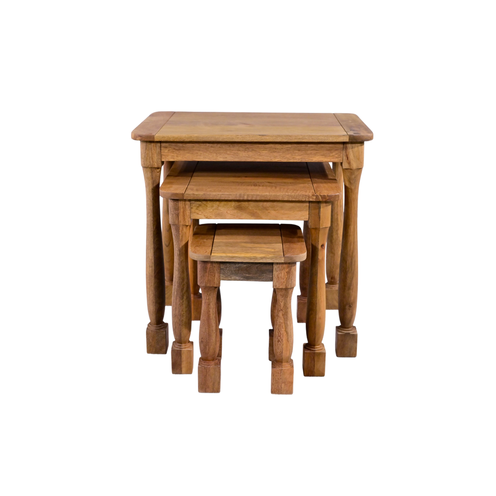 Set of three wooden nesting tables on a white background