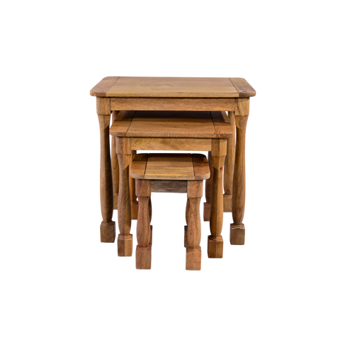 Set of three wooden nesting tables on a white background