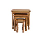 Set of three wooden nesting tables on a white background