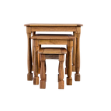 Set of three wooden nesting tables on a white background